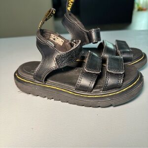 Dr. Martens Black Kids Sandals with Yellow Stitching‎